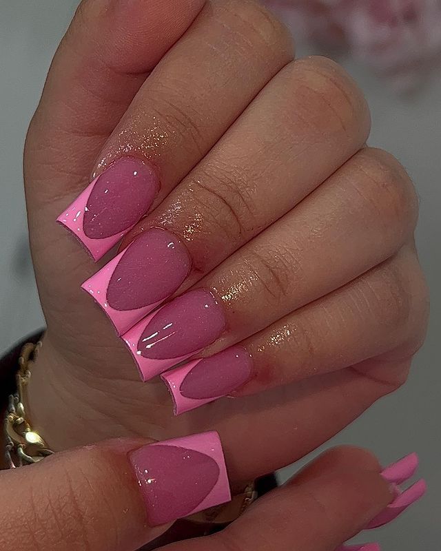 Eye-Catching Vibrant Pink Nail Design with Glossy Finishes and Elegant Gradient Effects.