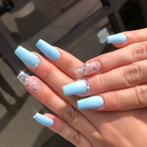 Chic Pastel Blue Nail Design with Rhinestones and Star Confetti for an Elegant Statement.