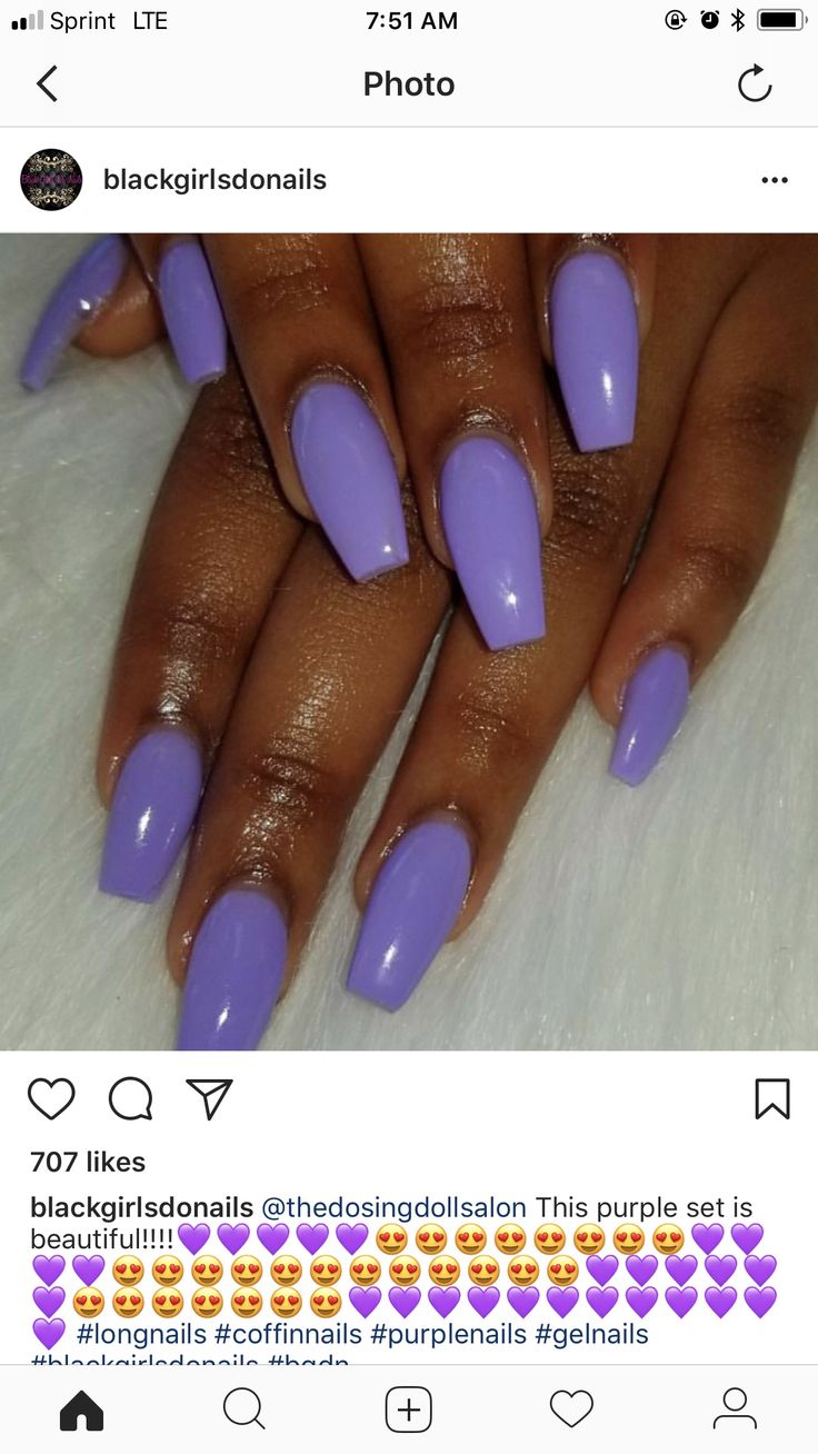 Chic Glossy Purple Coffin Nails: A Bold and Elegant Trend.