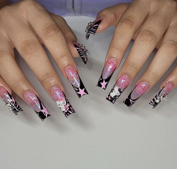 Glamorous Pink and Black Glitter Acrylic Nails with Playful Designs and Rhinestone Accents