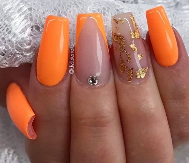 Bold Orange and Gold Foil Nails: A Chic Summer Glamour.