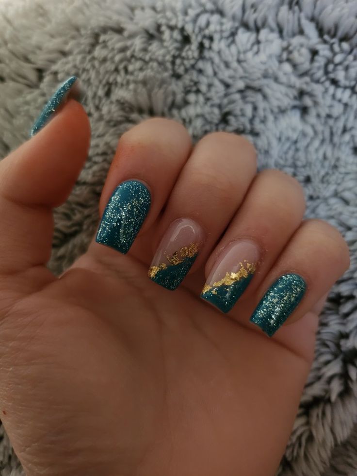 Chic Sparkling Teal Nail Design with Glitter, Glossy Finish, and Gold Foil Accents