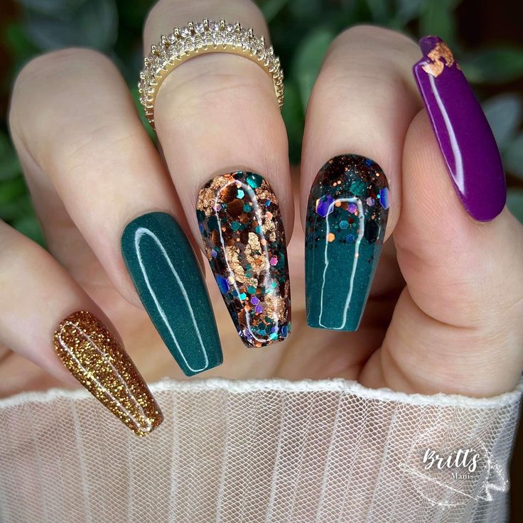 Vibrant Glamour: Colorful Nail Design with Teal, Bronze, and Burgundy Accents