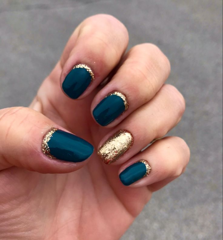 Elegant Teal and Gold Nail Design: A Vibrant Choice for Any Occasion.