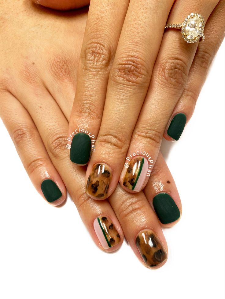 Bold Elegance: Matte Forest Green and Chic Brown Animal Print Nail Design