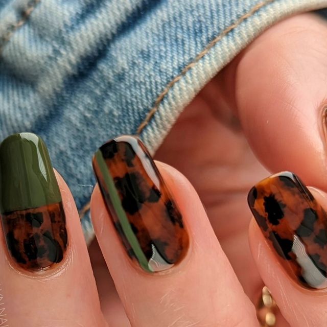 Chic Tortoiseshell Nail Design with Deep Green Accents and Glossy Finish.