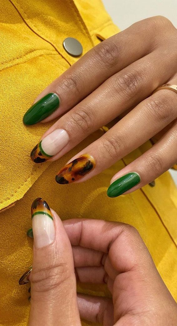 Striking Green and Tortoiseshell Nail Design for a Sophisticated Look.