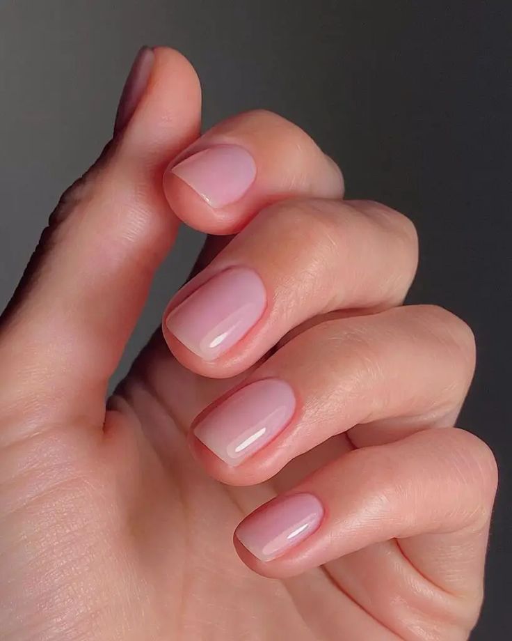 Elegant Soft Pink Natural Nail Design with a Smooth Glossy Finish for Any Occasion.