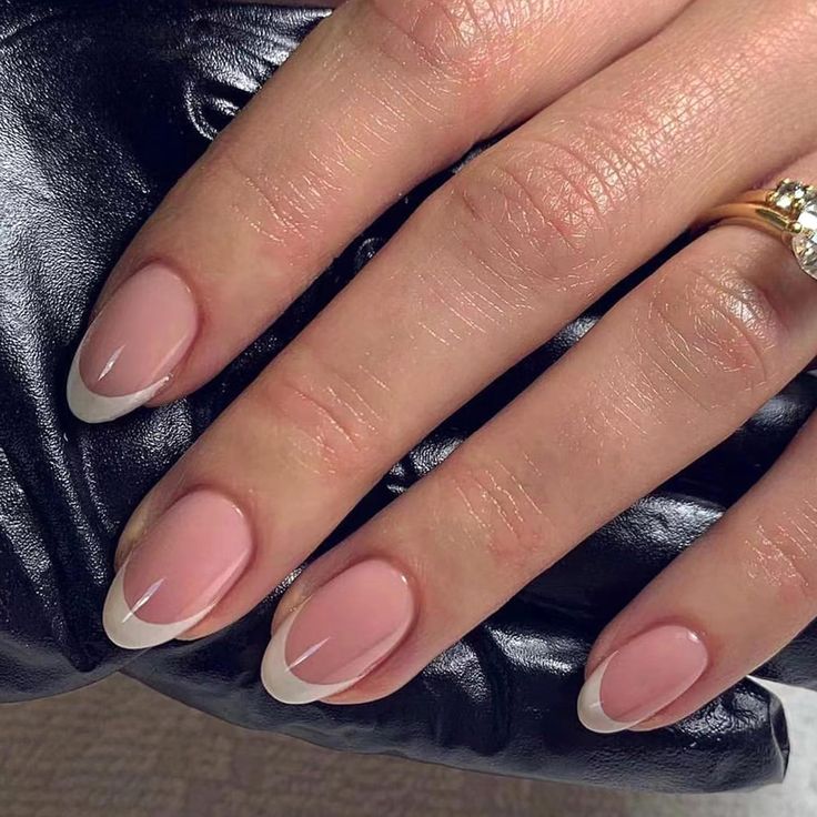 Chic Soft Pink and White Tips: A Contemporary Twist on Classic French Manicure.