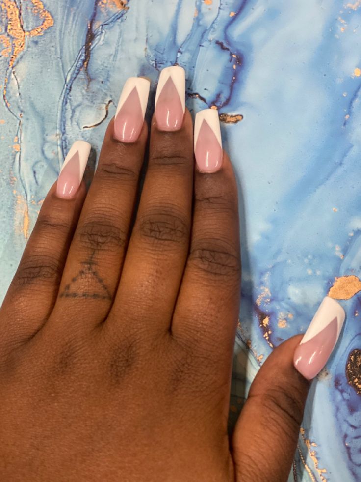 Chic and Modern Nail Design with Soft Pinks, White Tips, and Geometric Accents