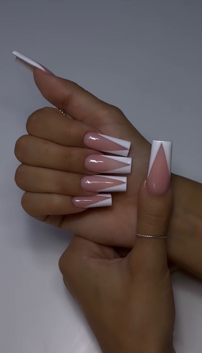 Elegant Geometric Nail Design: Sharp Tips with Pink and White Accents