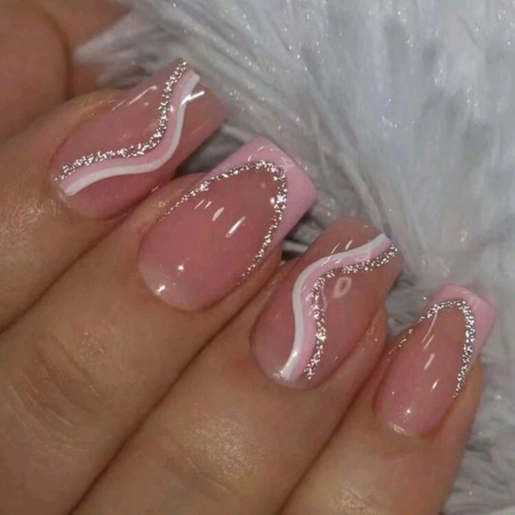 Chic Elegance: Nude and Pink Nail Design with Stylish Glitter Waves