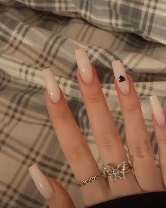 Chic Nude Ombre Nails with Bold Accent and Silver Rings: Perfect for Any Occasion