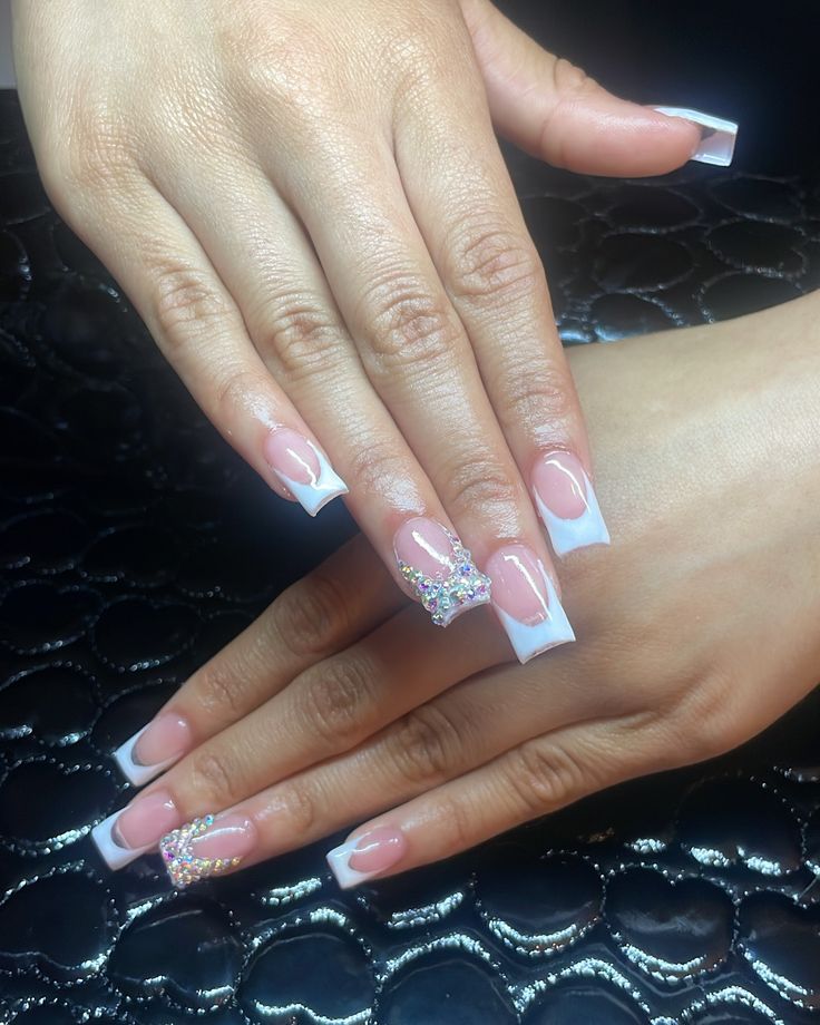 Chic French Tip Nail Design with Glamorous Rhinestone Accent