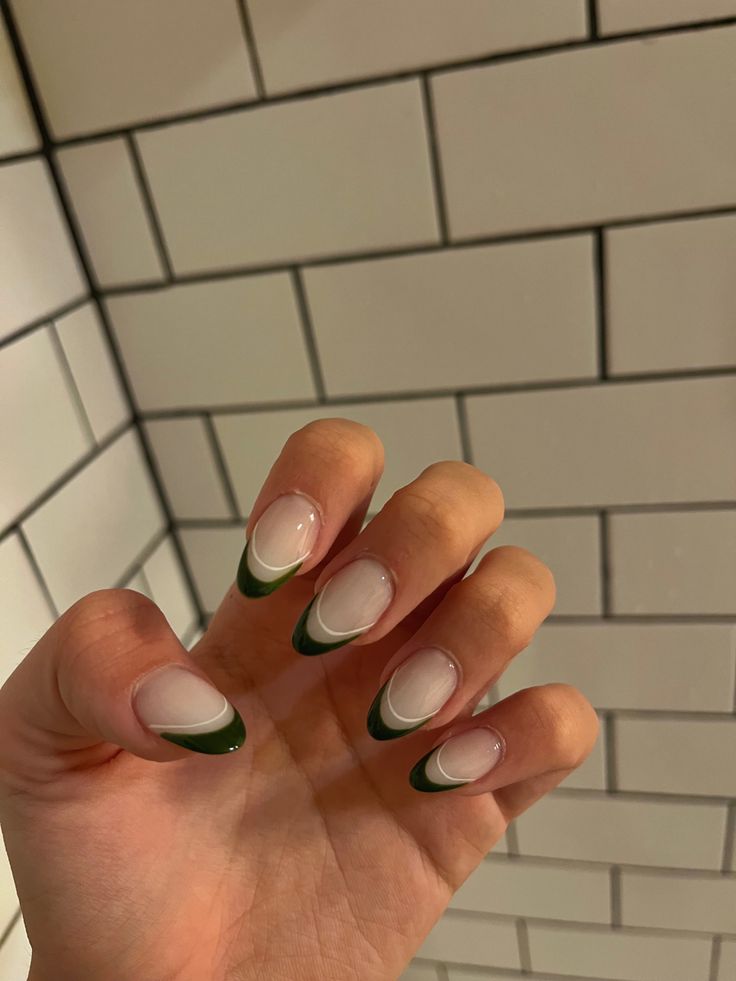 Chic Modern French Tip Nail Design with Nude Base and Dark Green Tips