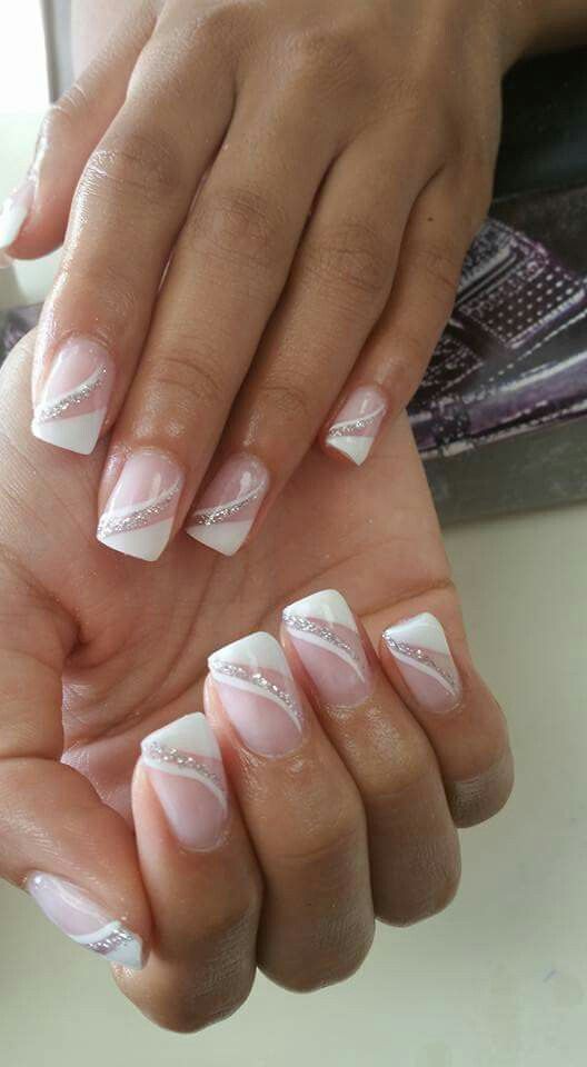 Sophisticated French Tip Nail Design with Delicate Pink, Diagonal Lines, and Silver Accents