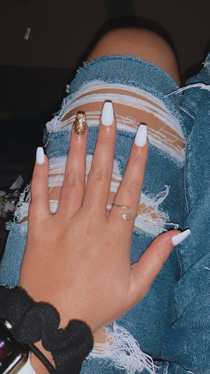 Chic White and Gold Nail Design Perfectly Paired with Casual Ripped Denim.