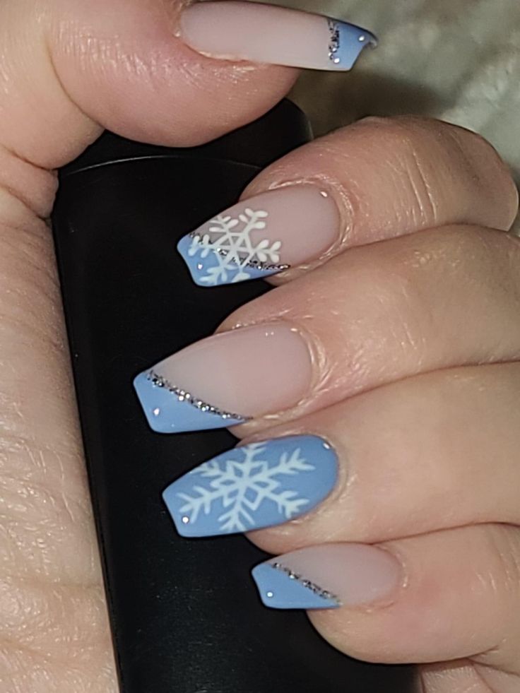 Elegant Winter-Inspired Nail Design with Calming Blue, White, and Silver Accents