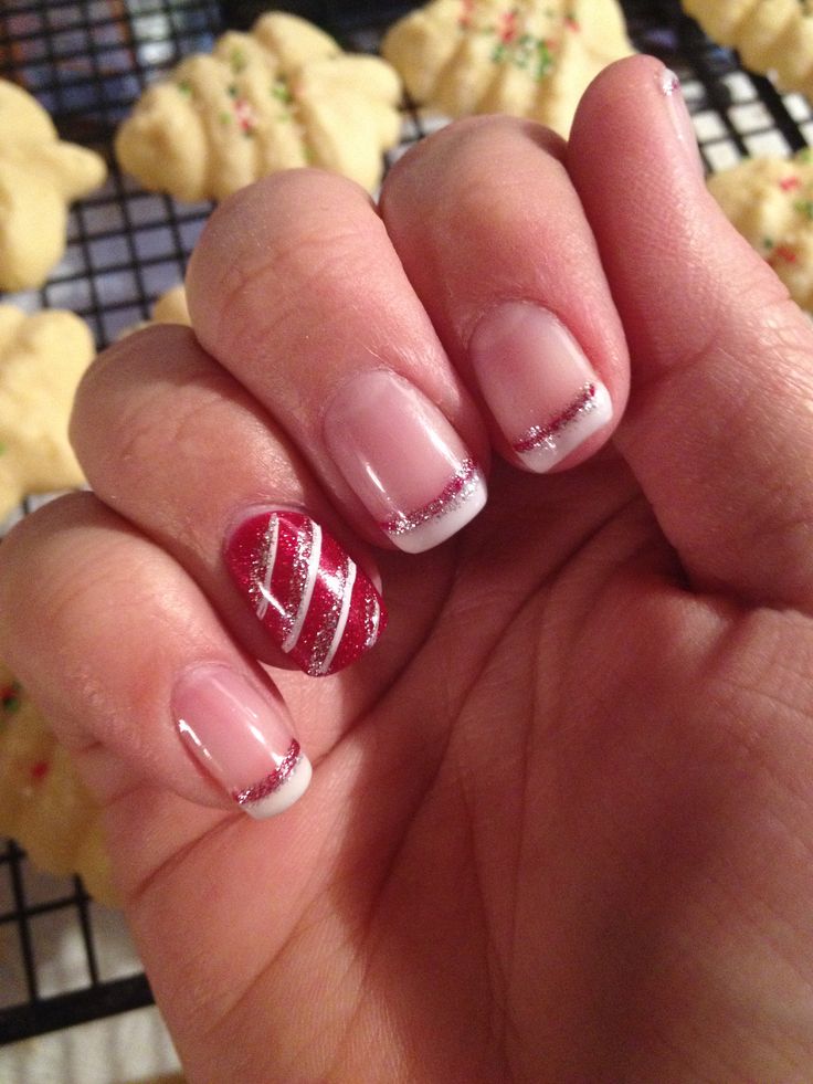 Elegant Festive Nail Design: Classic French Tips with Glittery Red Accent Nail