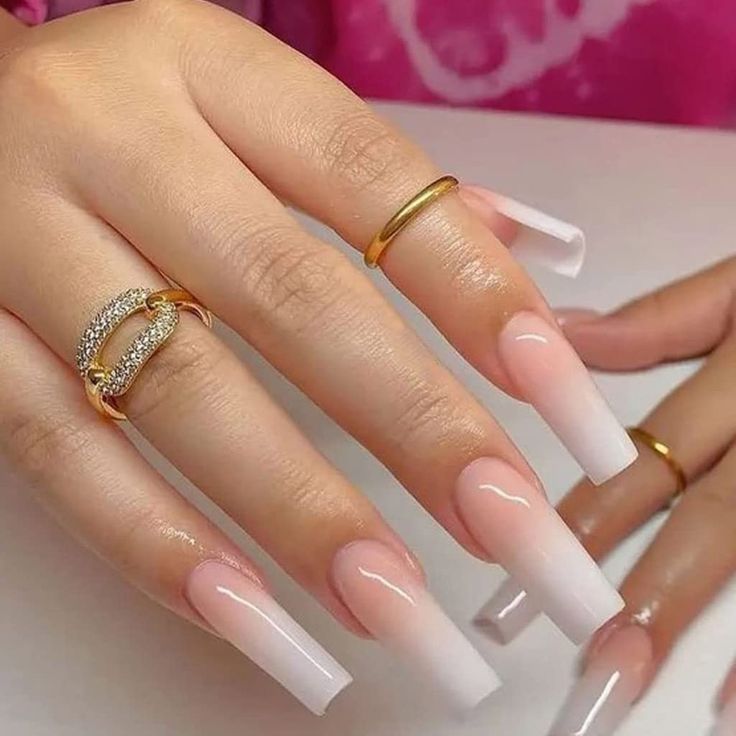 Elegant Ombre Nails: A Sophisticated Blend of Soft Pink and Crisp White with Minimalist Gold Accents.