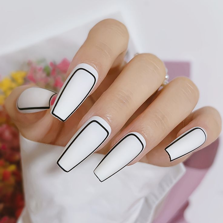 Chic Versatile White Nail Design with Bold Black Outlines for Any Occasion