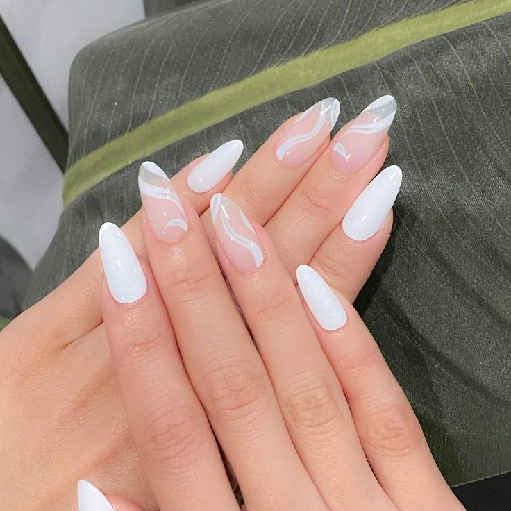 Chic Almond-Shaped Elegant White Nail Design with Wavy Lines.