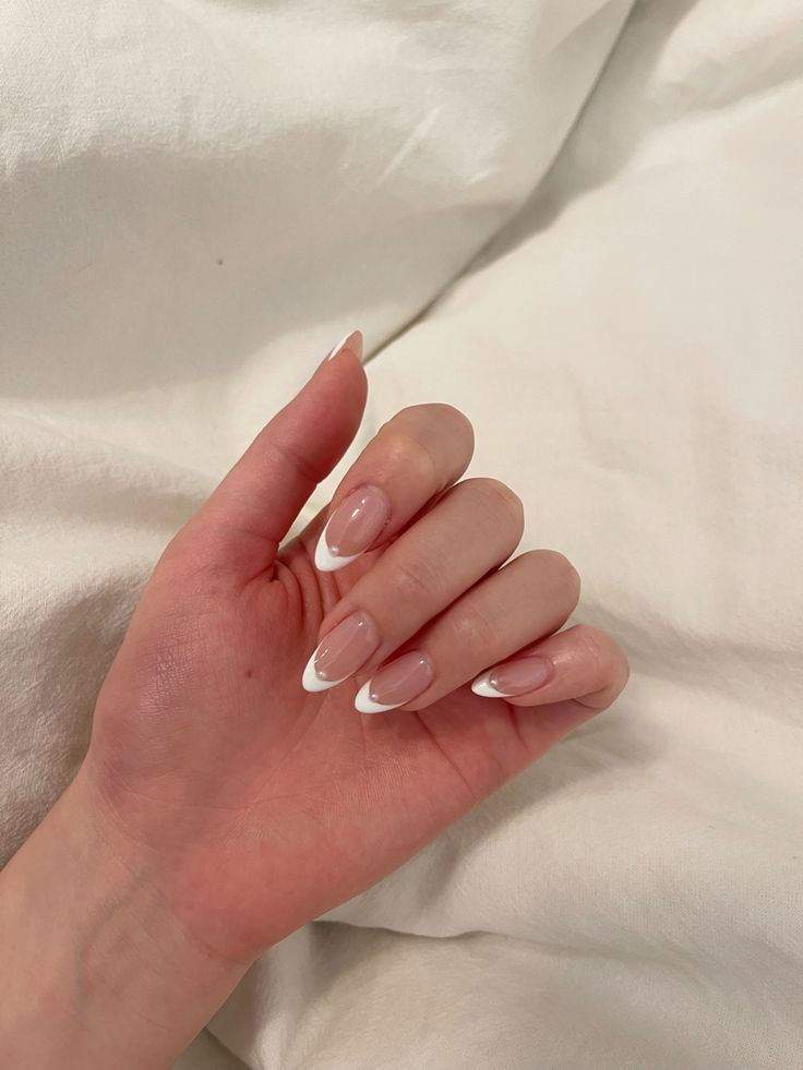 Chic Elegance: Classic French Tip Nail Design with Soft Nude Base