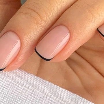 Elegant Minimalistic Black-Tipped Nude Nail Design for Versatile Occasions.