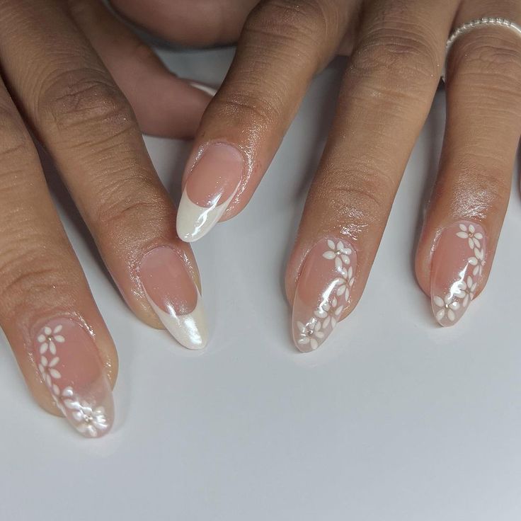 Sophisticated Elegant Nail Design with Floral Patterns and Natural Tips.