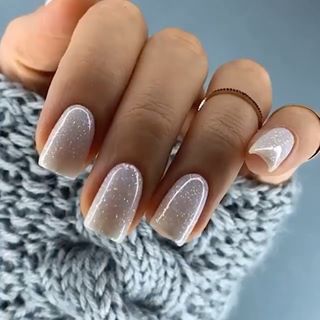 Ethereal Glittery Ombre Nails with Iridescent Finish and Minimalist Geometric Accents