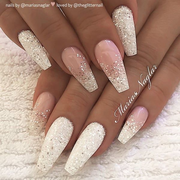 Elegant Glitter Ombre Coffin Nails: Soft Nude to Sparkling White Transition