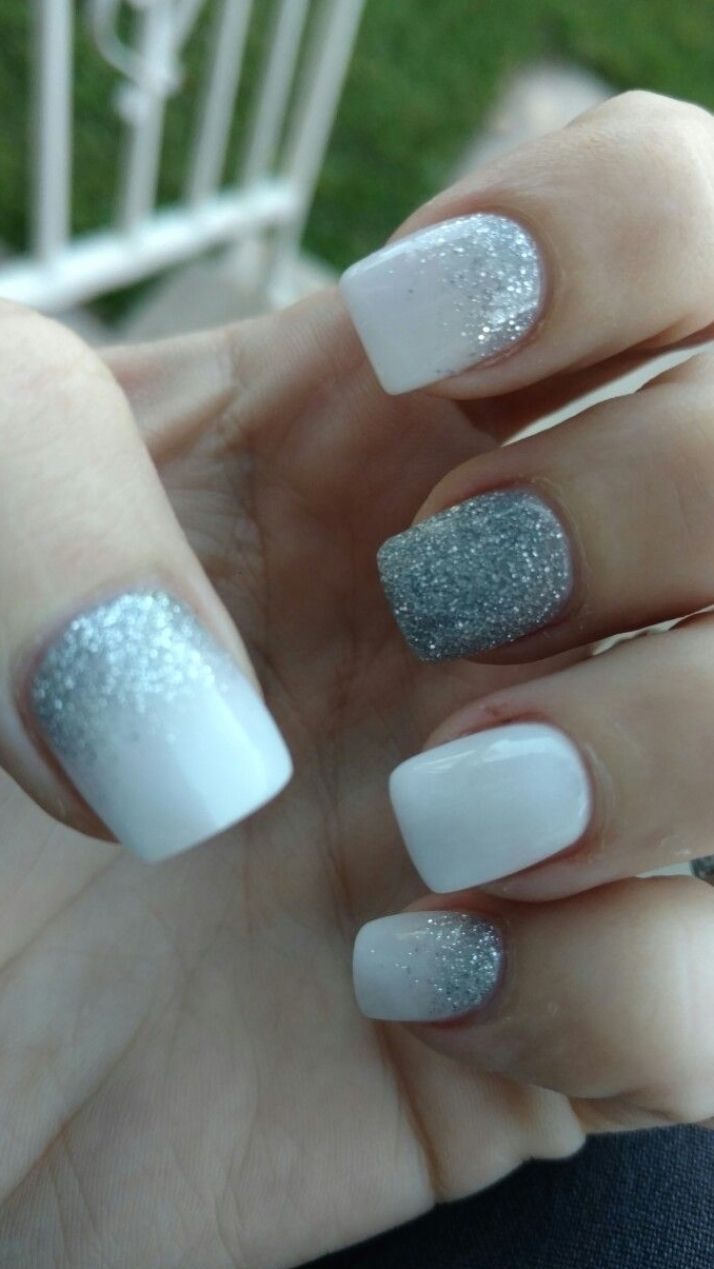 Chic Gradient Nail Design: Glossy White to Sparkling Silver with Matte and Glitter Finishes.