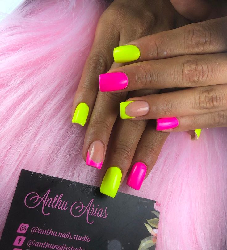 Playful Neon Nail Design: Bold Pink and Yellow with Chic Nude Accents for a Fun Modern Aesthetic.