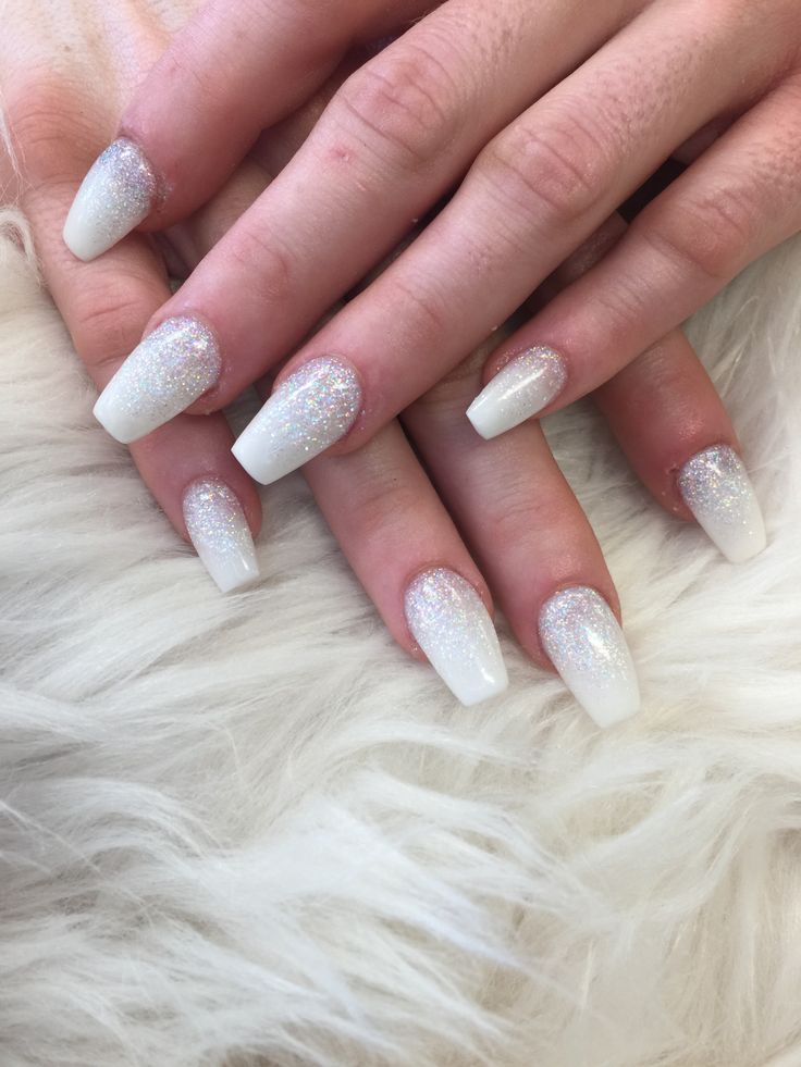 Elegant Gradient Nail Design: Soft White and Sparkling Silver for Glamorous Occasions.