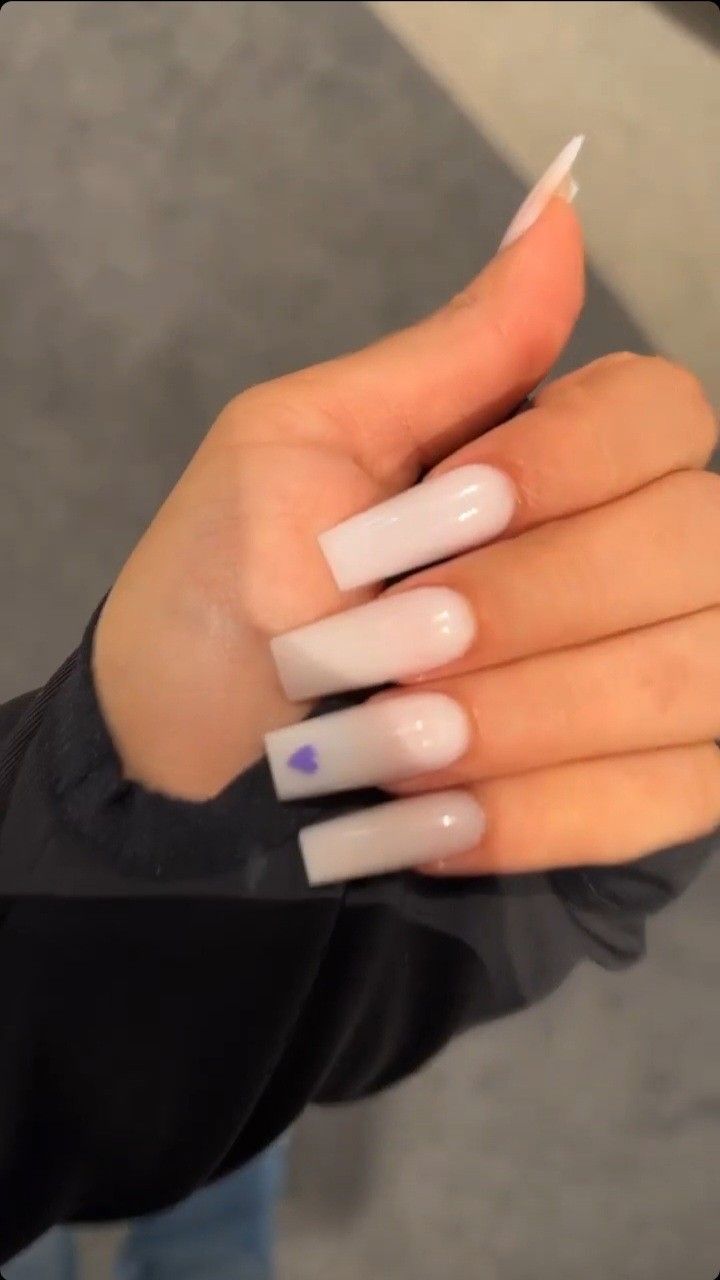 Charming Long Clear Acrylic Nails with Soft Pink Tone and Purple Heart Accent