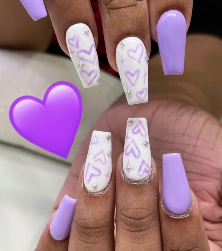 Whimsical Lavender and White Nail Design with Heart Accents and Sparkling Rhinestones