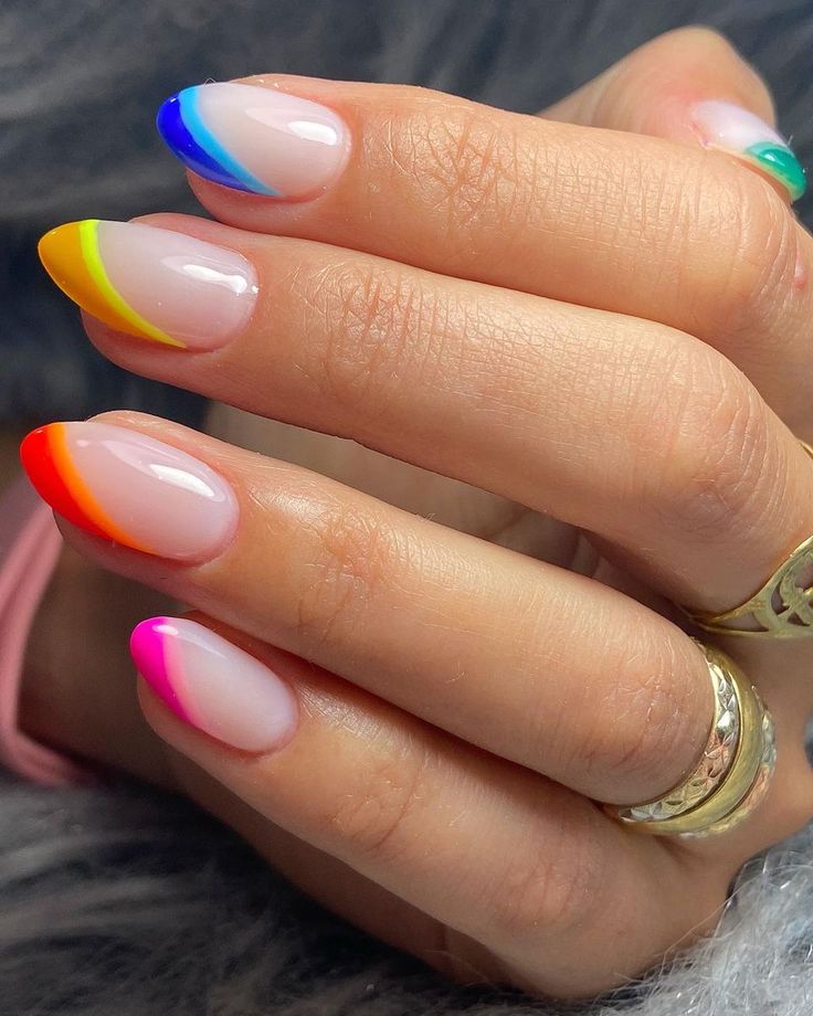 Vibrant Gradient Nail Design: Playful Summer Trend with Neon Colors.