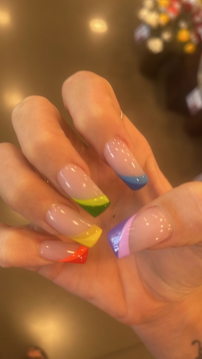 Colorful Tip Nail Design with Nude Base: A Playful Rainbow Aesthetic.