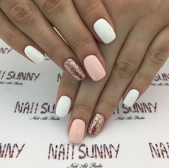 Chic Nail Design: Glossy White and Soft Pink with Sparkling Rose Gold Accents