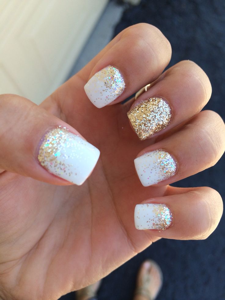 Elegant White and Gold Nail Design: Sleek Squares with Glamorous Glitter Accents.