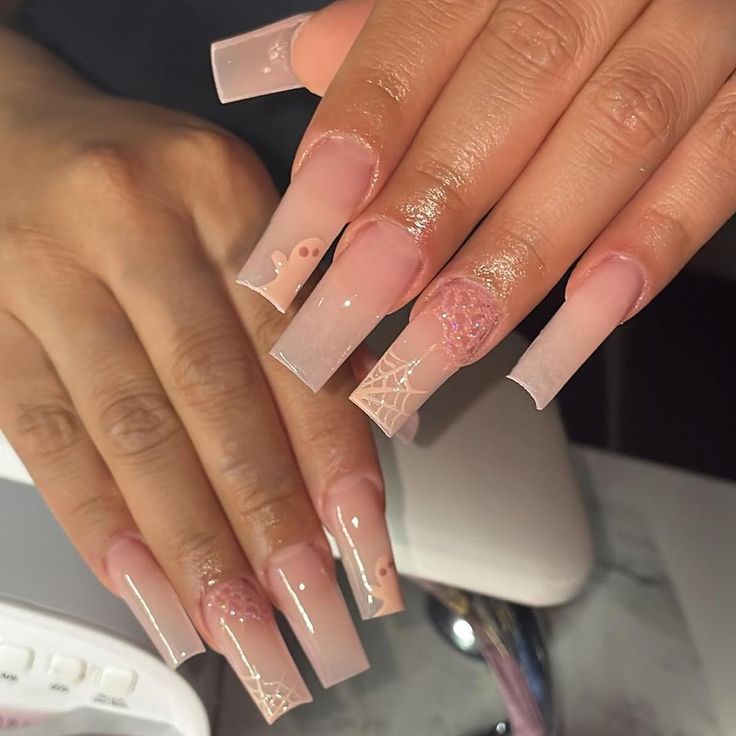 Elegant Gradient Nail Design with Long Square Acrylics and Delicate Embellishments.