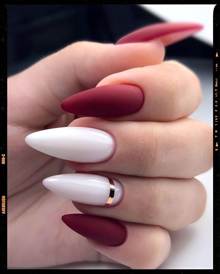 Elegant Chic Nail Design: Bold Burgundy, Crisp White, and Gold Accents