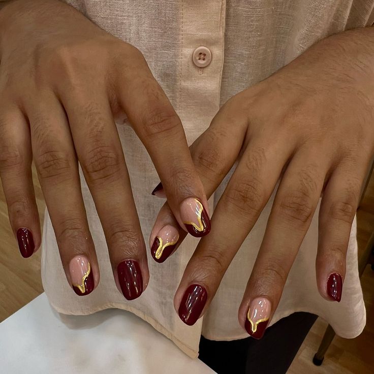 Wine Red Nails With Gold