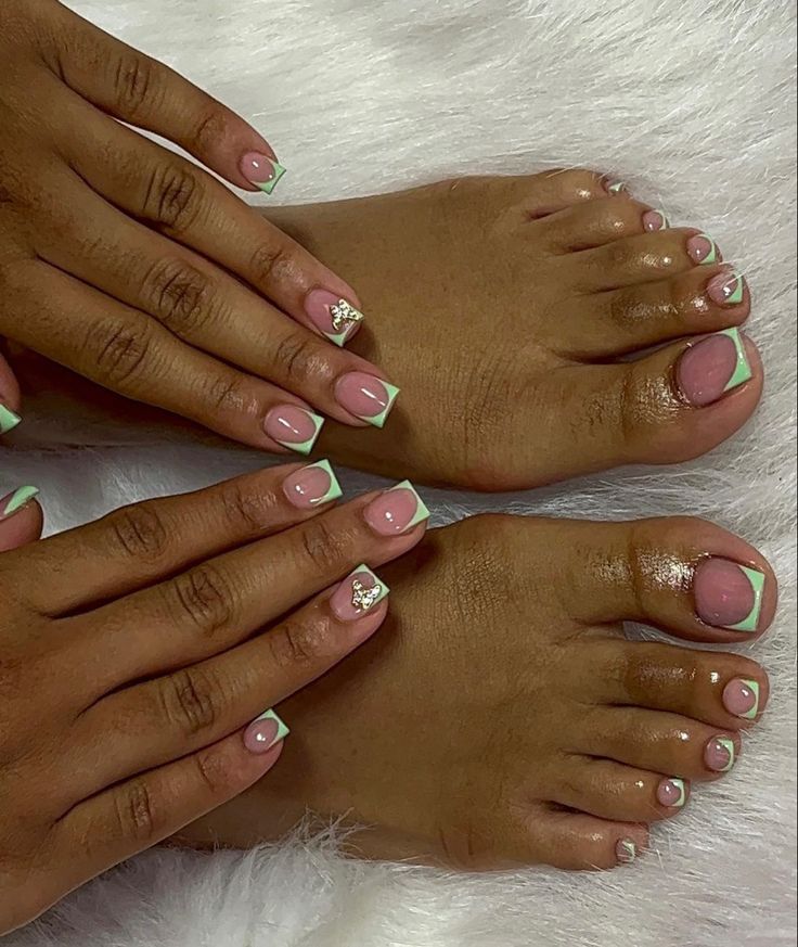 Chic Elegant Manicure and Pedicure: Soft Pink with Mint Green Tips and Sophisticated Embellishments.