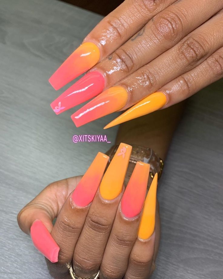 Playful Pink and Orange Ombre Gradient Nail Design with Delicate Accents