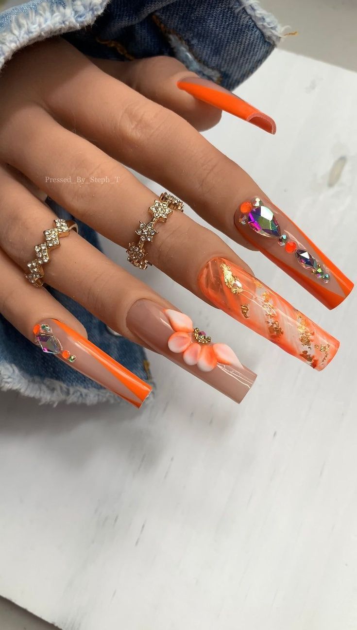 Bold and Playful Nail Design with Colorful Embellishments and Creative Accents.