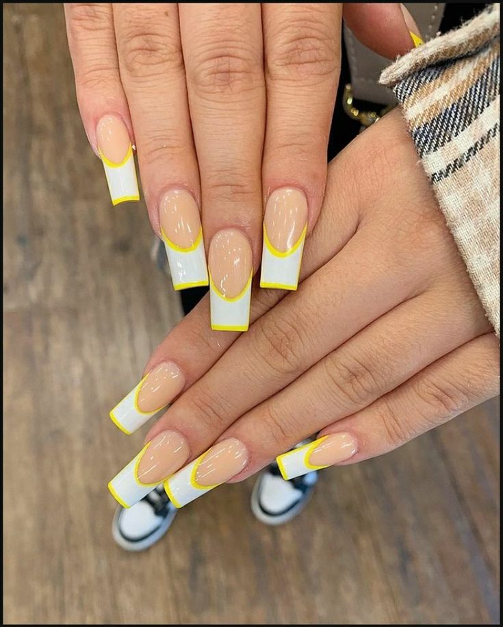 Modern Chic Nail Design with Long Square Tips and Bold Color Accents.