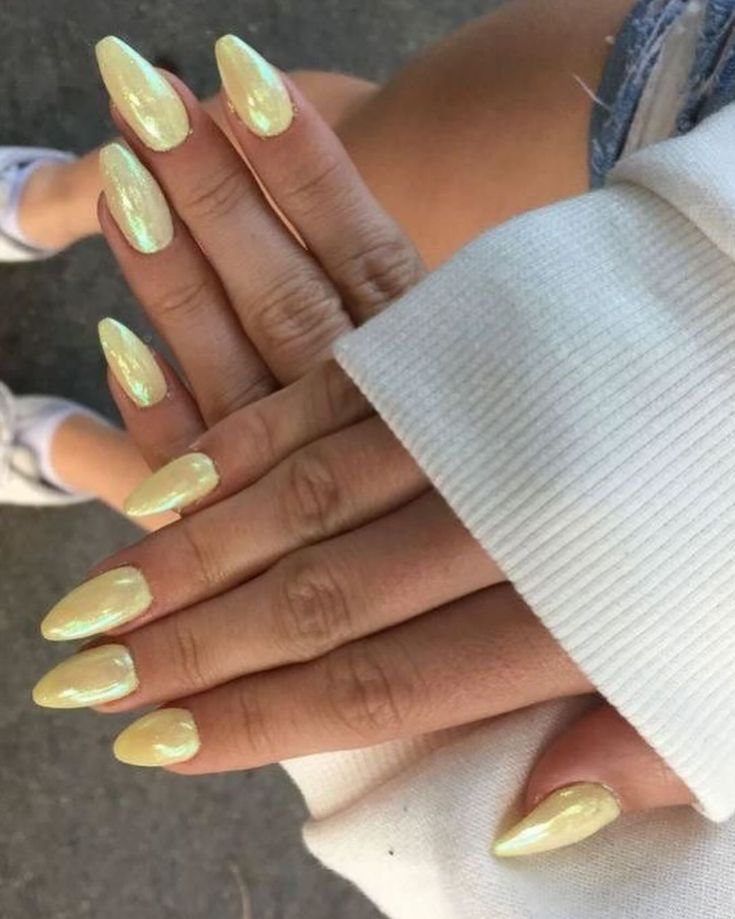 Chic Lemon-Yellow Glossy Nail Design: Perfect for Summer Elegance and Playful Glam.