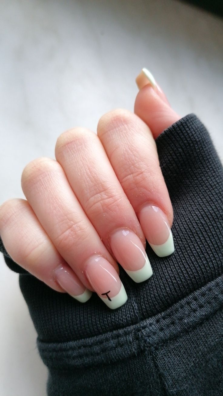 Sophisticated Nude Nail Design with Mint Green Accents