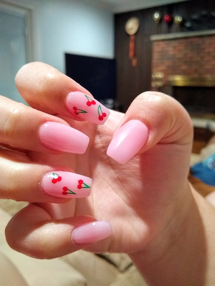 Charming Cherry Blossom Nail Design: Elegant Pink Nails with Playful Cherry and Leaf Accents.